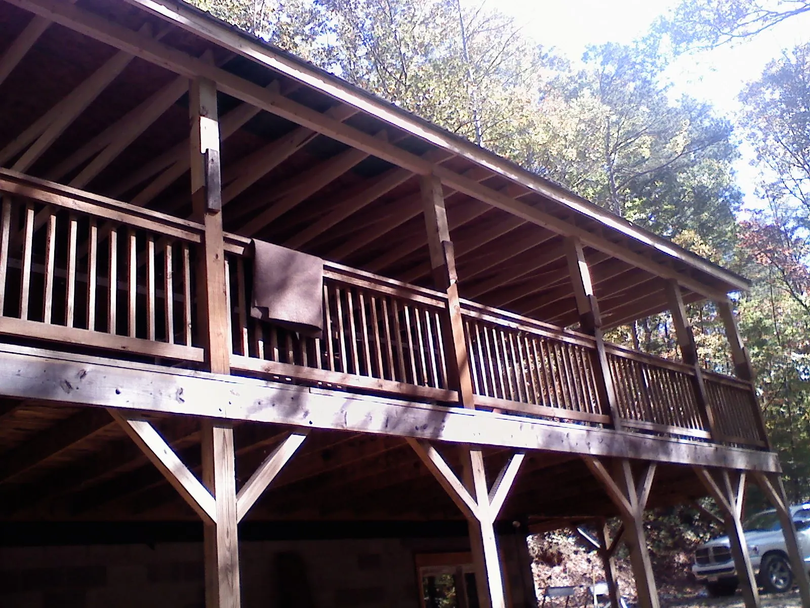 Timber framing under a new elevated porch and deck — Roof Leak Repair in Sandy Spring by Roofing Brothers